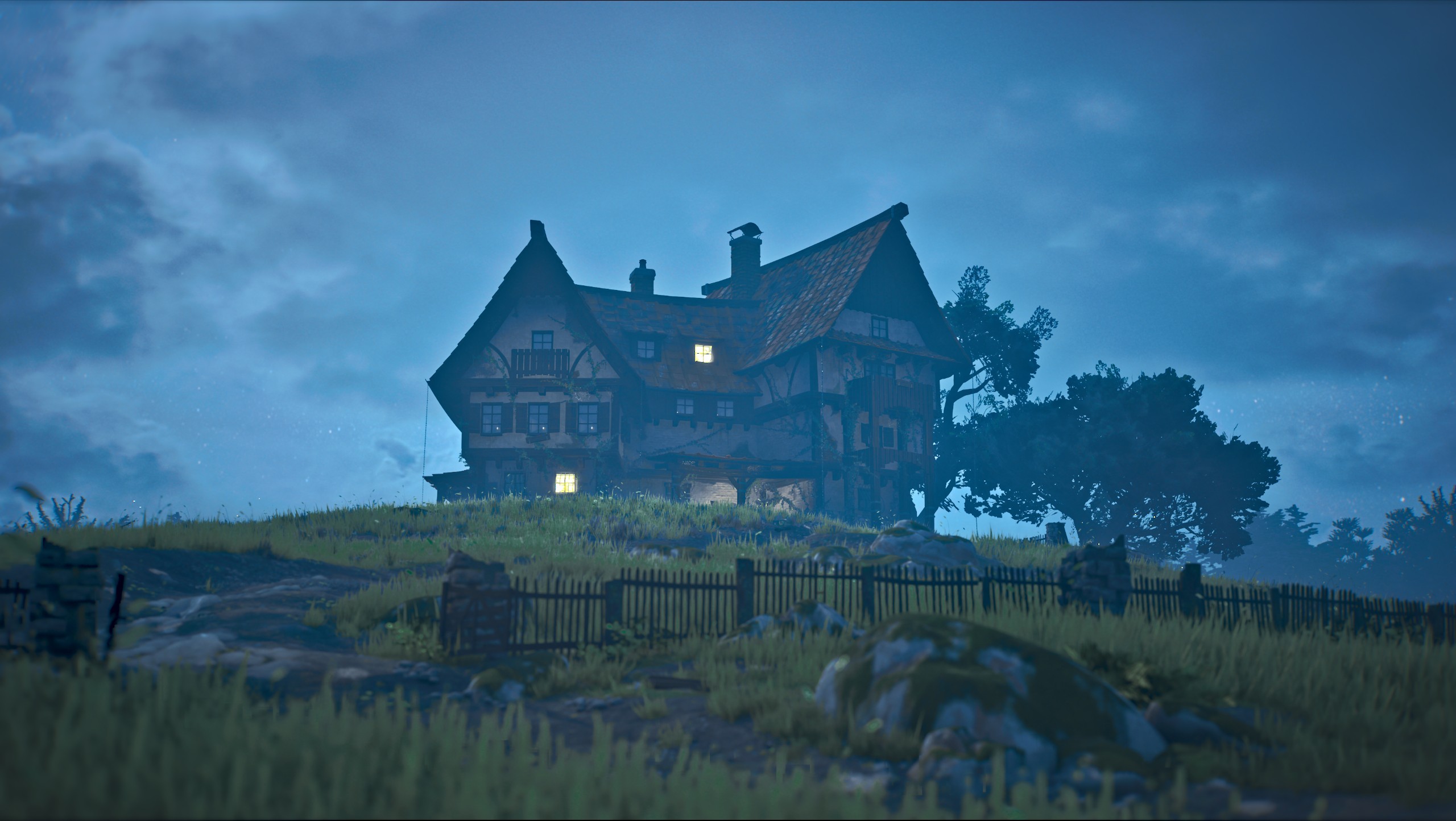 Atmospheric night view of the timbered house with blue lighting and fog